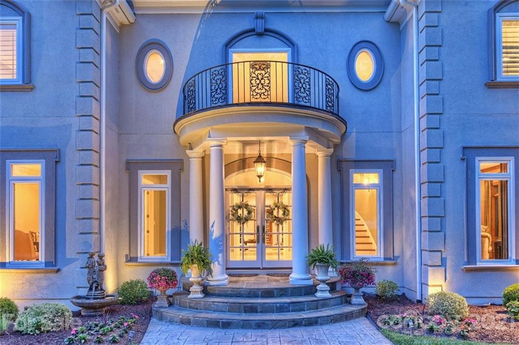 13710 Robert Walker Drive Davidson, NC 28036 - Photo 3 of 48 a front view of a house