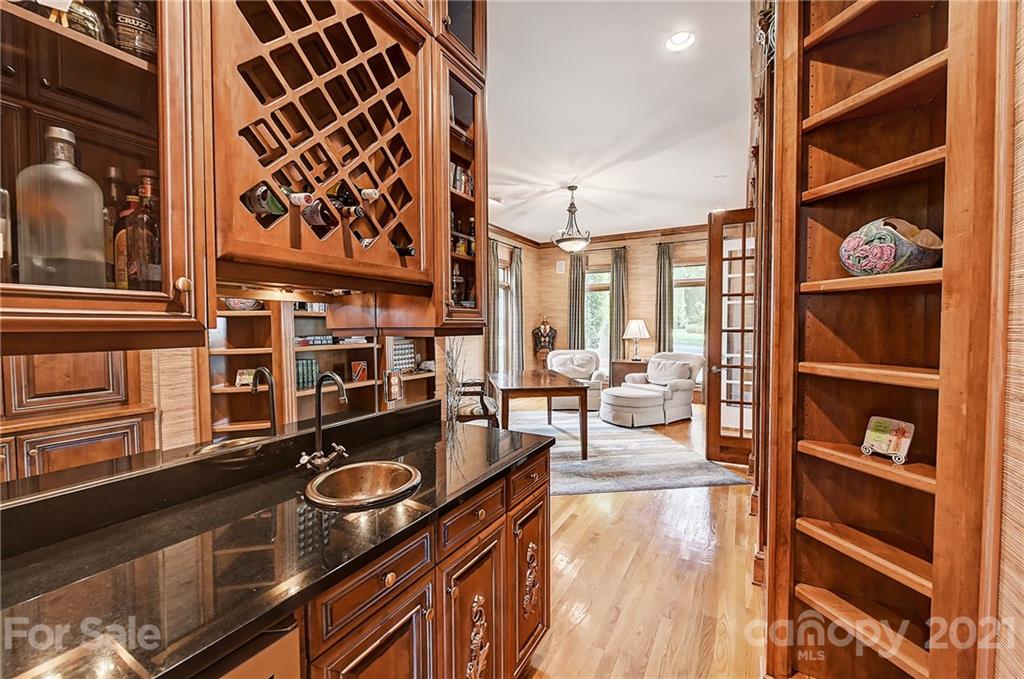13710 Robert Walker Drive Davidson, NC 28036 - Photo 26 of 48 a kitchen with a stove and a cabinet