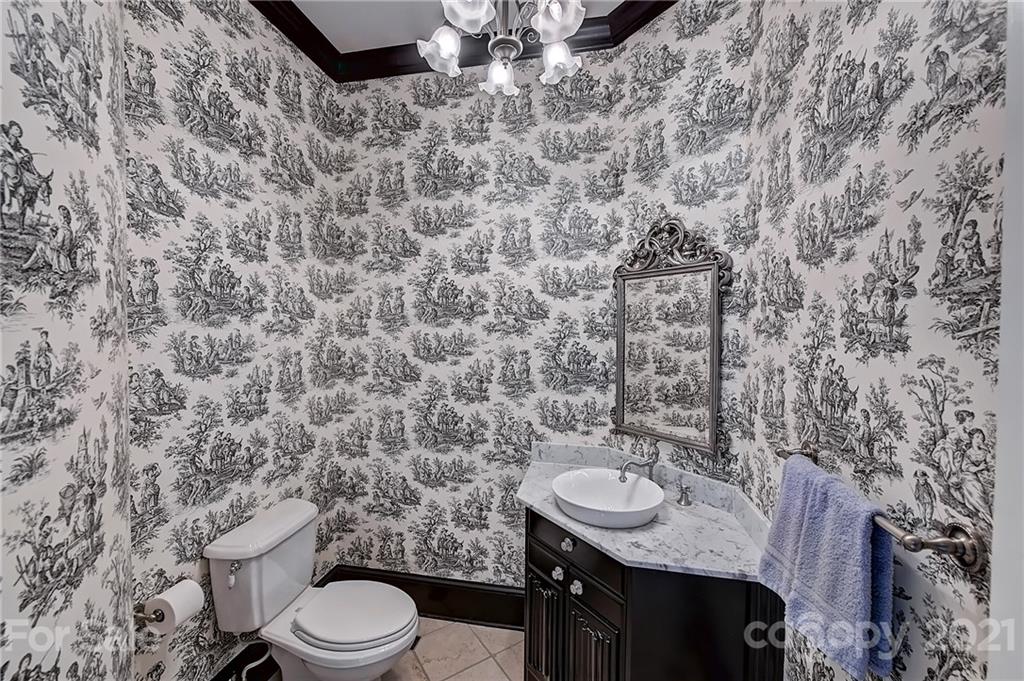 13710 Robert Walker Drive Davidson, NC 28036 - Photo 29 of 48 a bathroom with a granite countertop toilet and sink