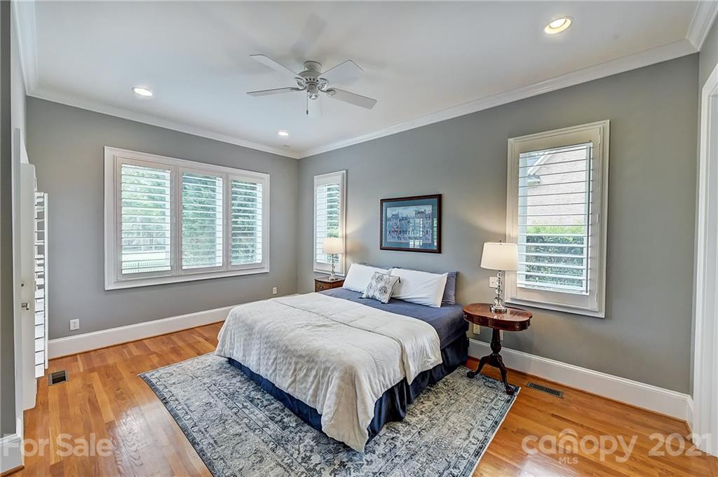 13710 Robert Walker Drive Davidson, NC 28036 - Photo 32 of 48 a bedroom with a bed and a window