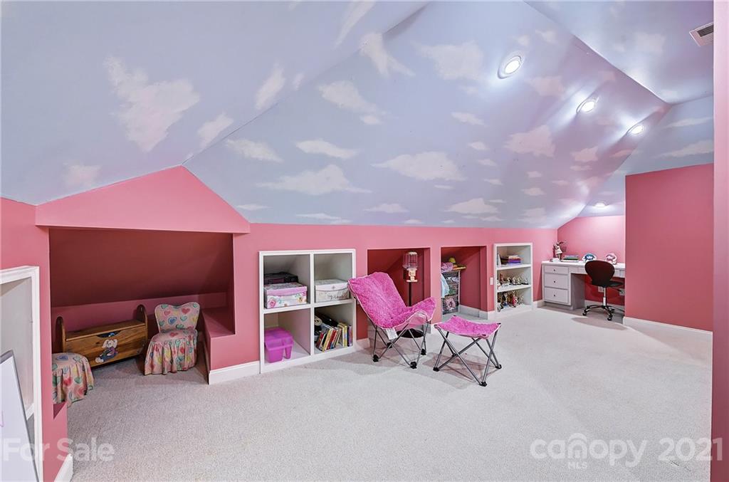 13710 Robert Walker Drive Davidson, NC 28036 - Photo 39 of 48 a living room with furniture and a large window