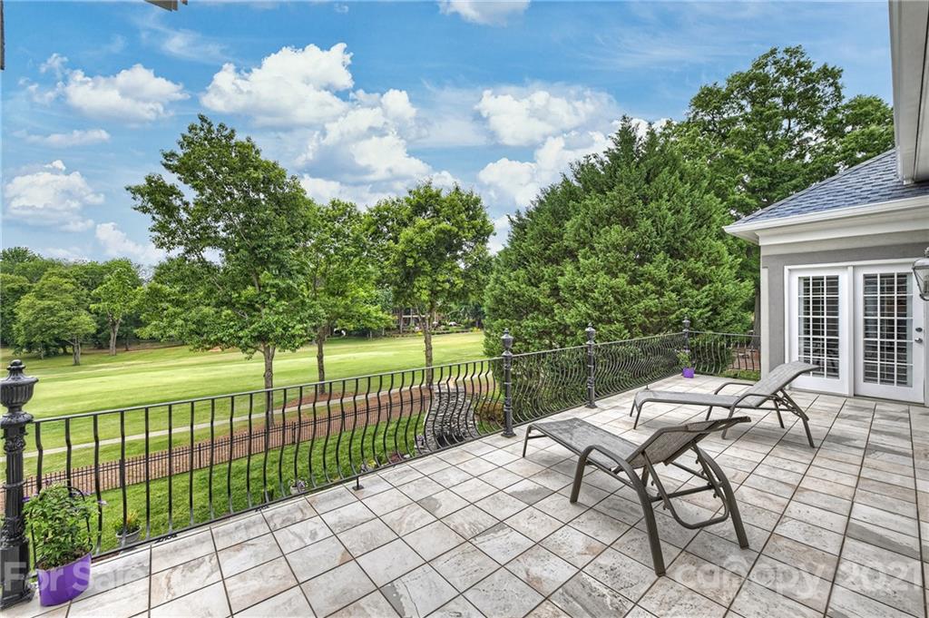 13710 Robert Walker Drive Davidson, NC 28036 - Photo 42 of 48 a view of a patio with a yard