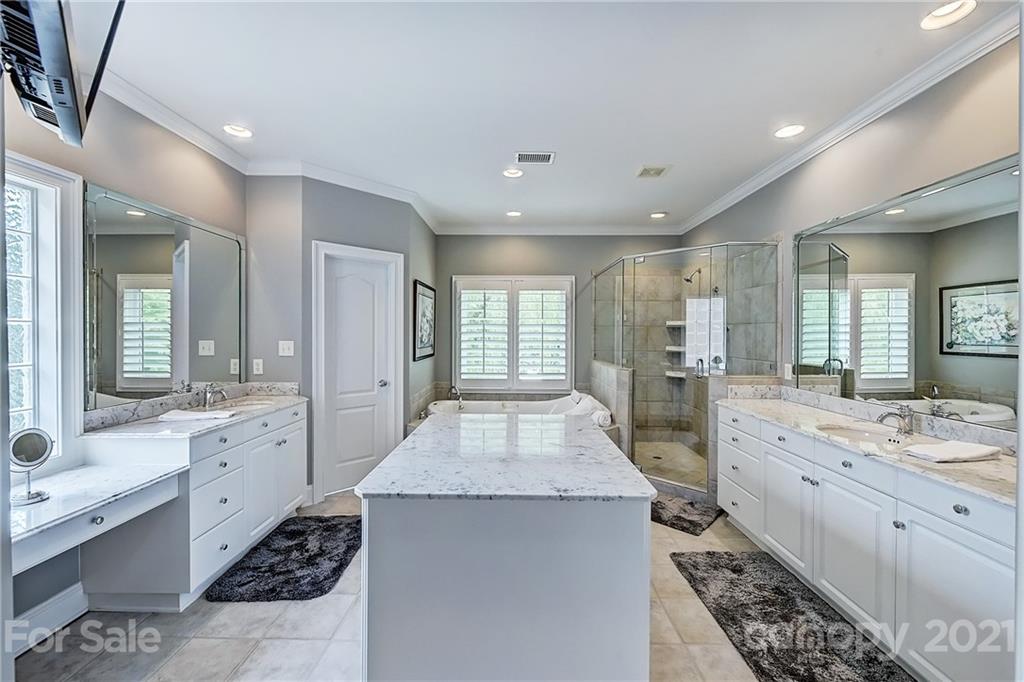 13710 Robert Walker Drive Davidson, NC 28036 - Photo 44 of 48 a large white kitchen with a large window