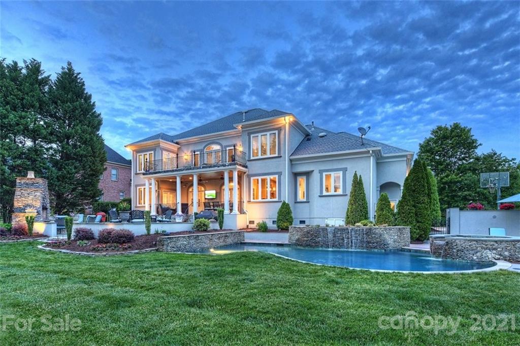 13710 Robert Walker Drive Davidson, NC 28036 - Photo 8 of 48 a front view of a house with a yard