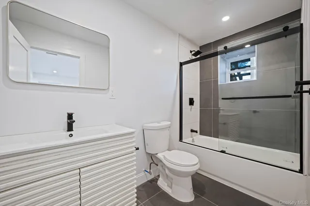 a view of a kitchen with a sink cabinets and a window