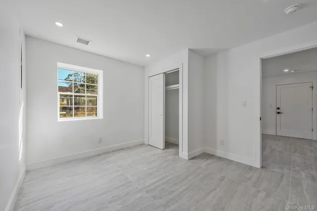 an empty room with windows