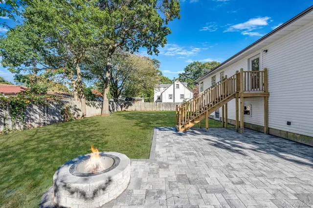 a view of a park with large trees