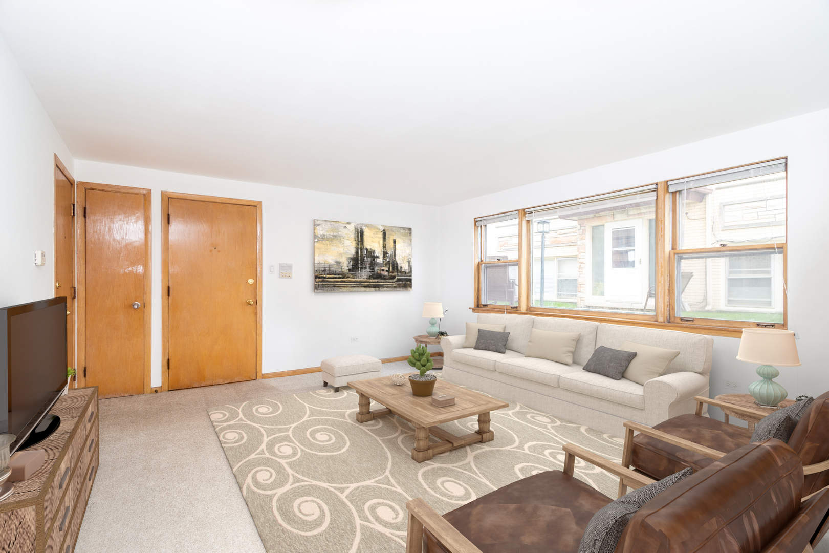 7418 North Harlem Avenue, Unit 2 Chicago, IL 60631 - Photo 3 of 10 a living room with furniture and a flat screen tv