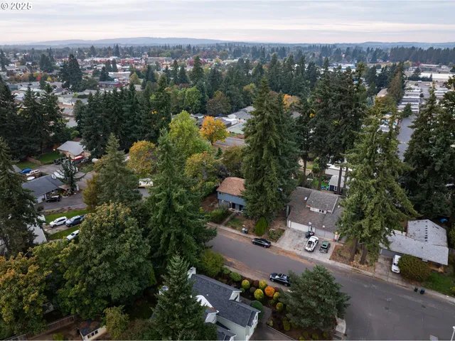 an aerial view of a city with lots of residential buildings