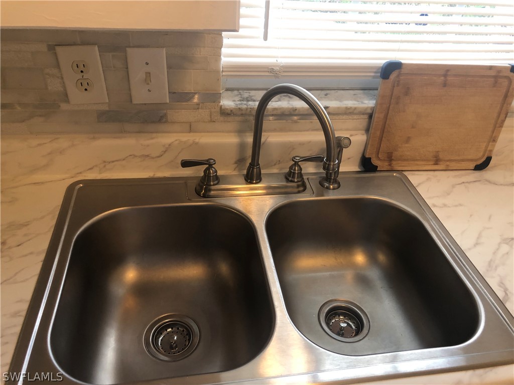 208 Davis Road Lehigh Acres, FL 33936 - Photo 14 of 20 a close view of sink