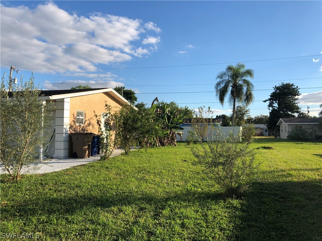 208 Davis Road Lehigh Acres, FL 33936 - Photo 4 of 20 a view of a backyard