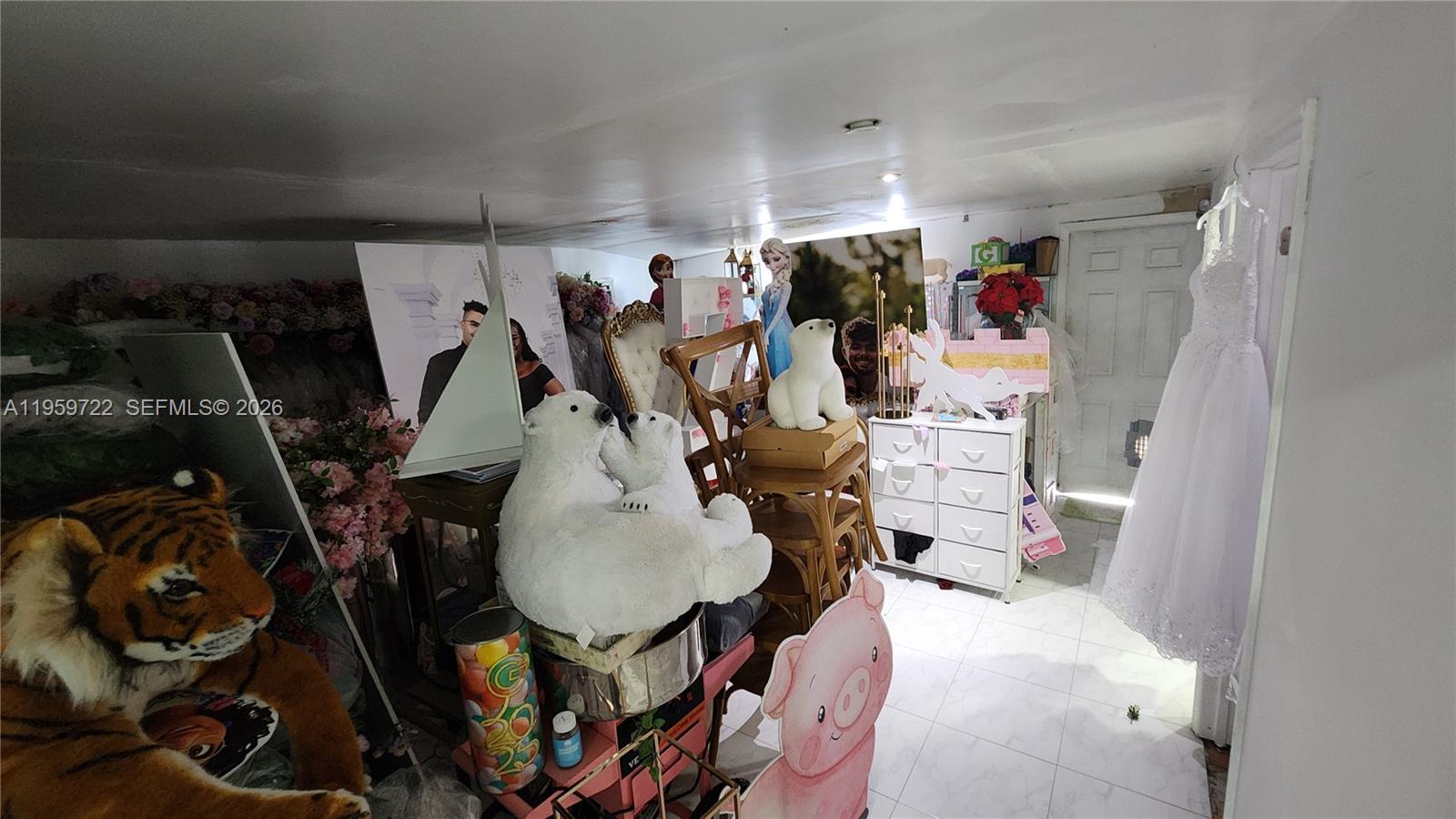 20022 Southwest 118th Avenue Miami, FL 33177 - Photo 14 of 23 a view of a room with gym equipment