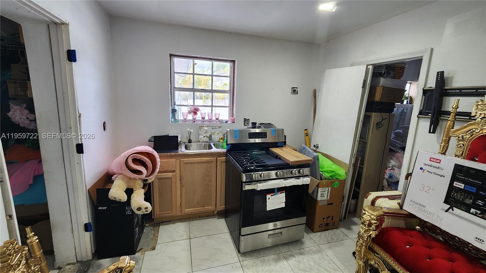 20022 Southwest 118th Avenue Miami, FL 33177 - Photo 5 of 23 a room with storage and utility