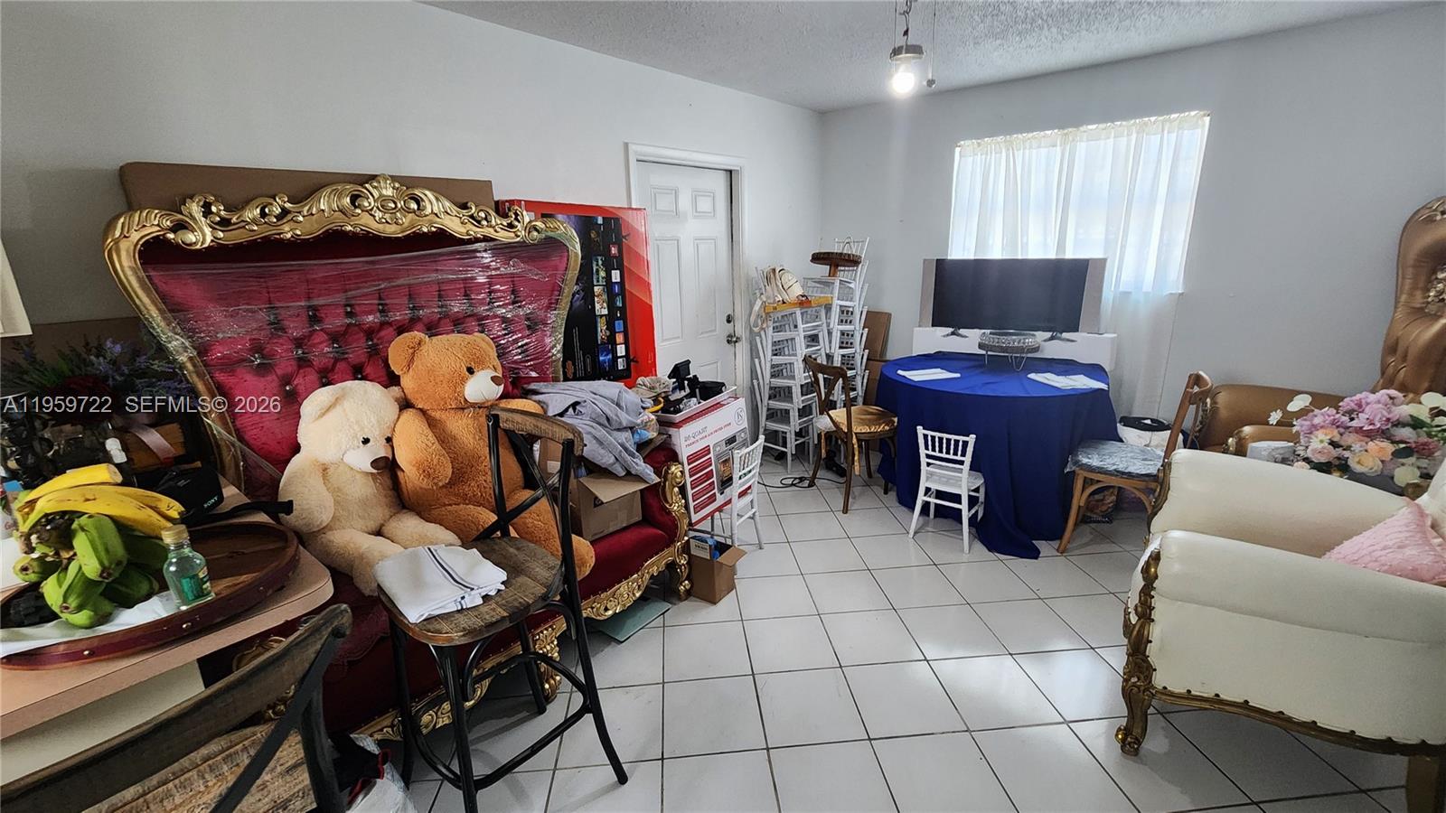 20022 Southwest 118th Avenue Miami, FL 33177 - Photo 7 of 23 a bedroom with furniture and a window