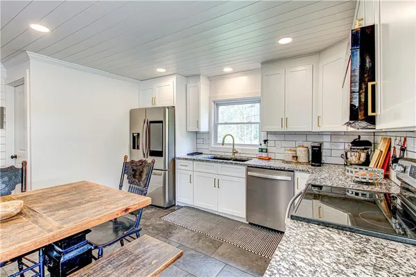 a utility room with washer and dryer