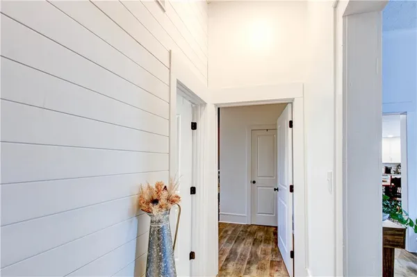 a bedroom with a bed and a table in it