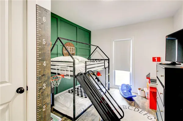 a bathroom with a toilet sink and shower