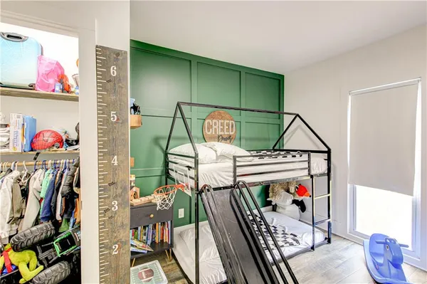 a bathroom with a sink a vanity and a mirror