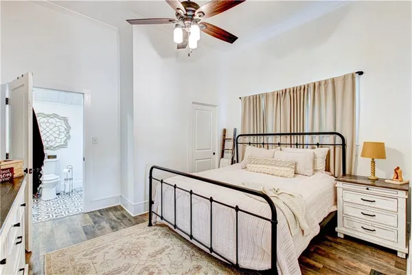 a view of a house with a yard covered in snow