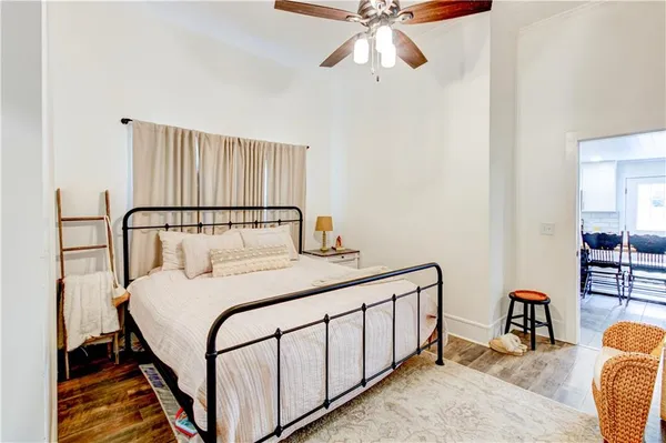 a view of a house with swimming pool and a yard