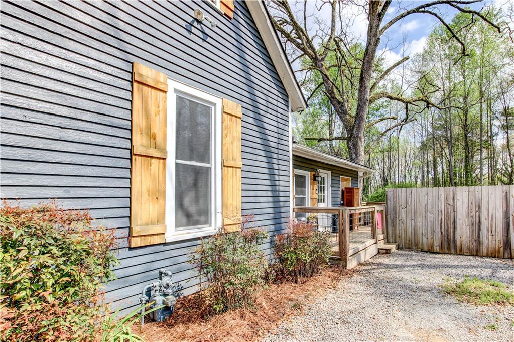 226 Mill Street Bowdon, GA 30108 - Photo 54 of 62 a front view of a house with garden