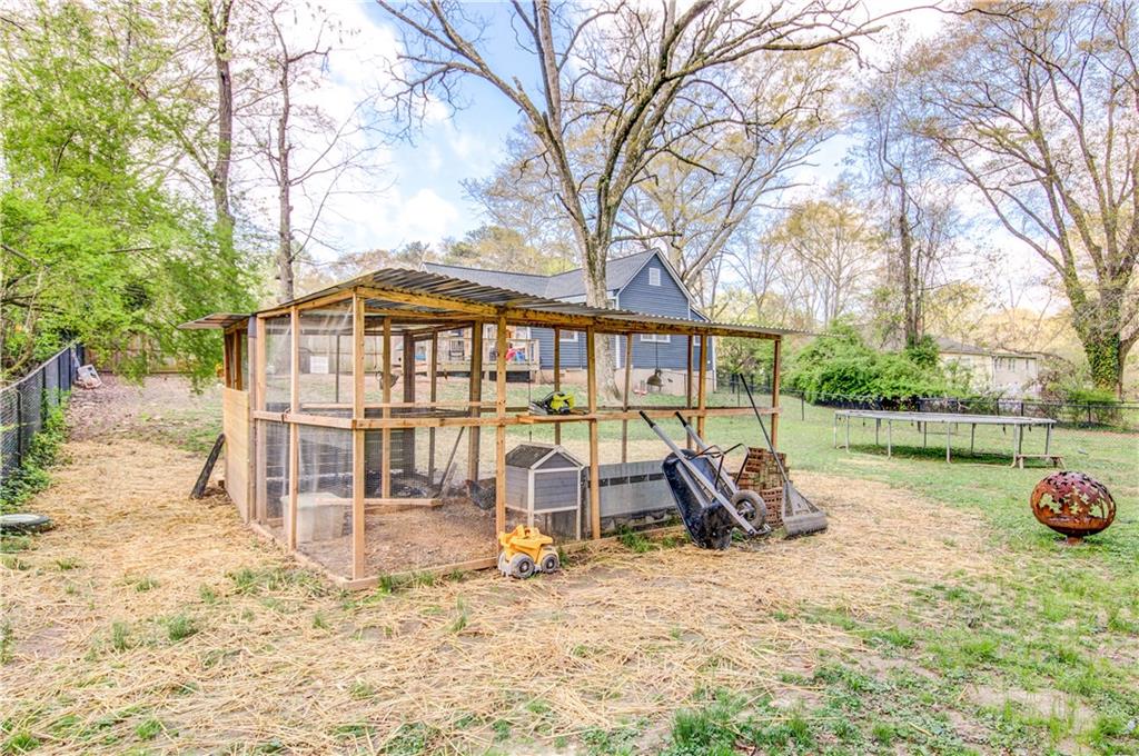 226 Mill Street Bowdon, GA 30108 - Photo 62 of 62 a view of a house with backyard and sitting area