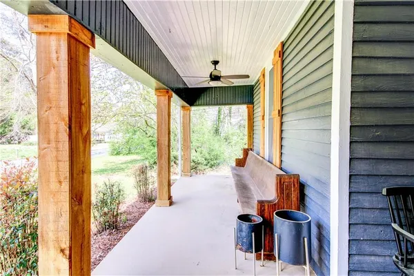 a view of a porch with chairs