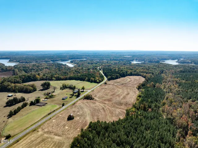 an aerial view of residential building and ocean