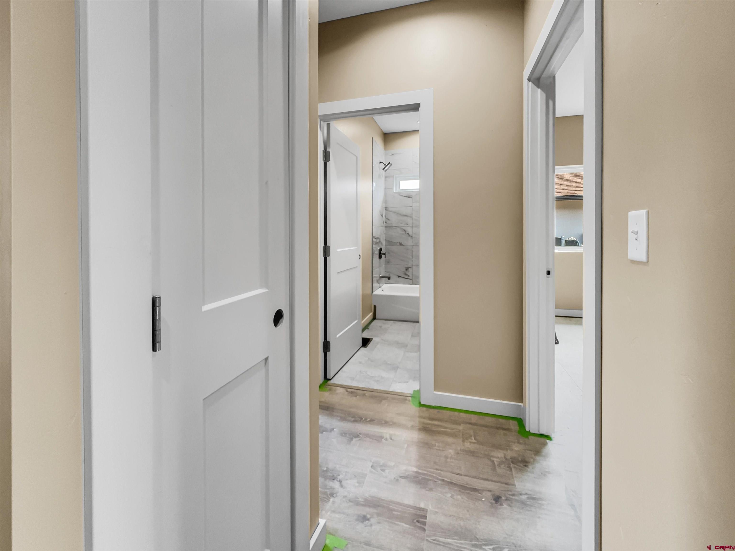 511 Juniper Place Cortez, CO 81321 - Photo 30 of 36 view of a bathroom with a glass shower door and a bathroom