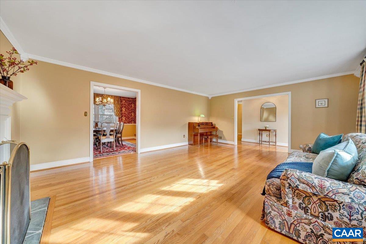 3558 Hartland Road Southwest Roanoke, VA 24015 - Photo 12 of 73 a living room with furniture and wooden floor