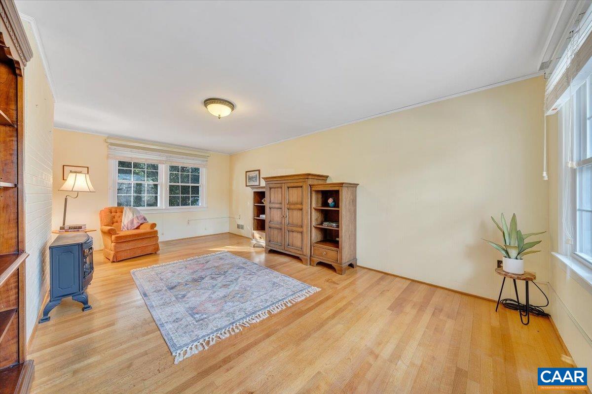 3558 Hartland Road Southwest Roanoke, VA 24015 - Photo 18 of 73 a living room with furniture and a wooden floor