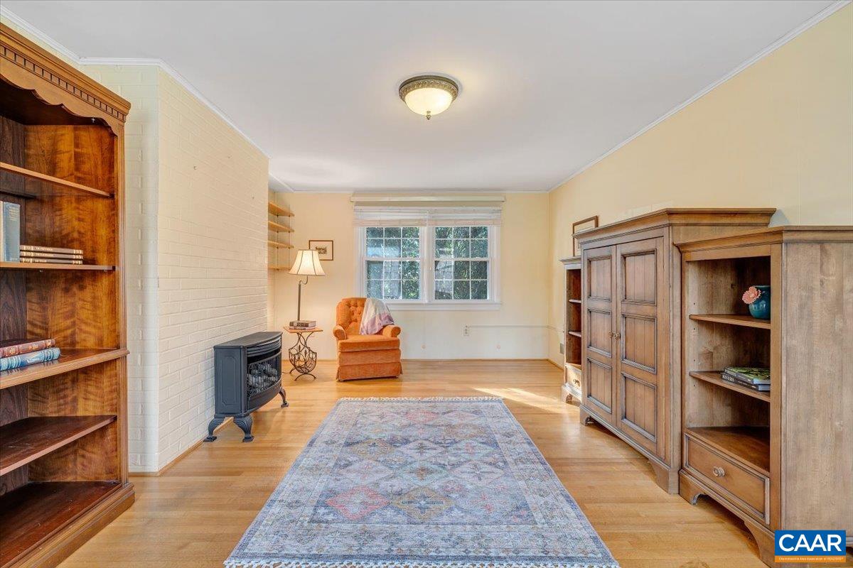3558 Hartland Road Southwest Roanoke, VA 24015 - Photo 19 of 73 a living room with furniture and a window