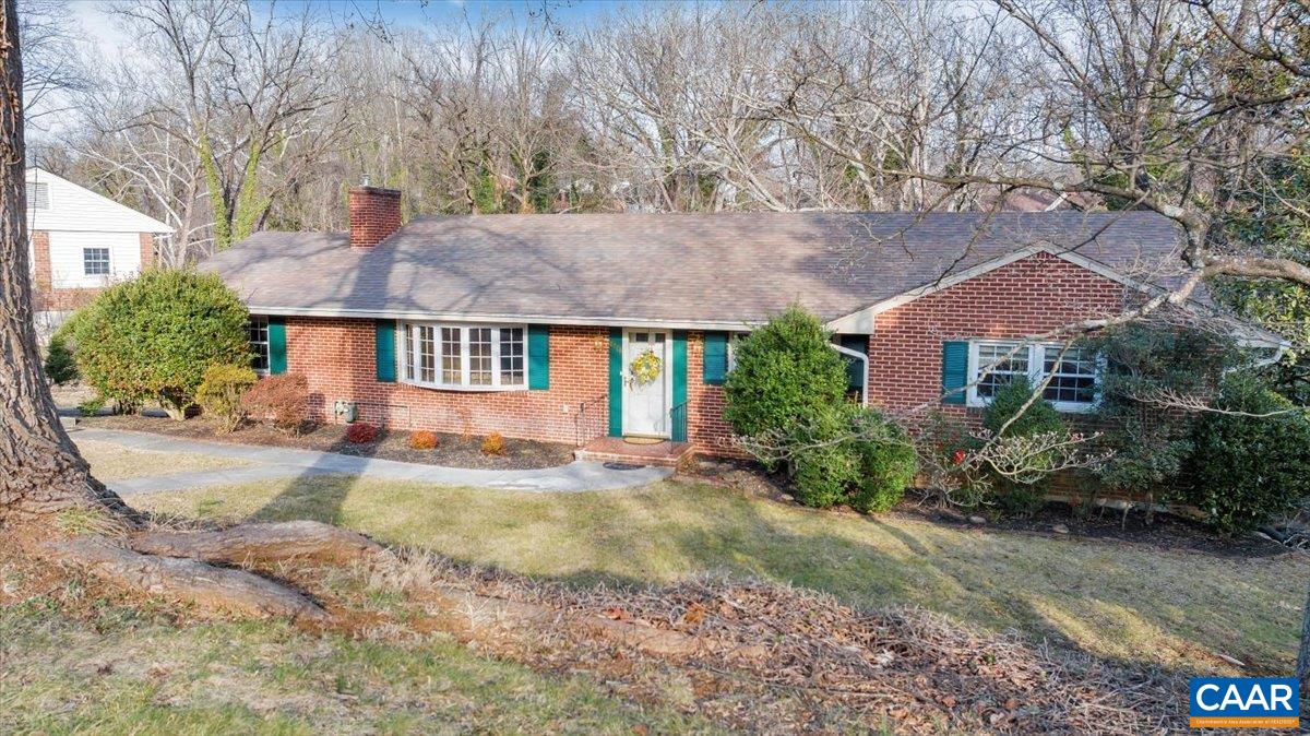 3558 Hartland Road Southwest Roanoke, VA 24015 - Photo 72 of 73 a front view of a house with a yard and shrubs