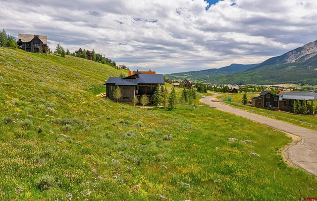 a view of a lake with houses with outdoor space