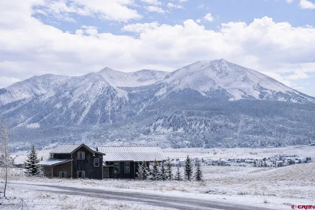 a view of a dry with mountains in the background