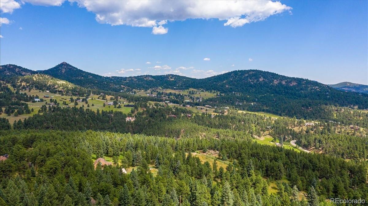 7303 Plowsher Way Morrison, CO 80465 - Photo 4 of 12 a view of lake with mountain