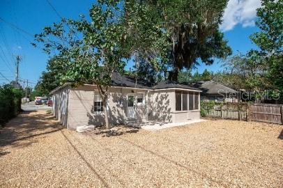 919 Southwest 6th Avenue Gainesville, FL 32601 - Photo 3 of 17 a view of a house with wooden fence
