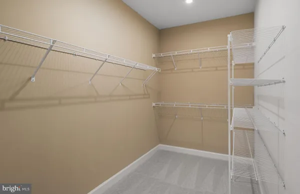 a view of a room with racks on the wall