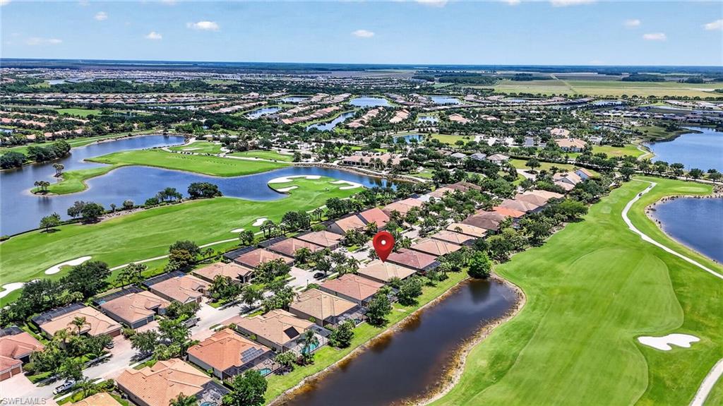 6124 Victory Drive Ave Maria, FL 34142 - Photo 23 of 50 an aerial view of a city