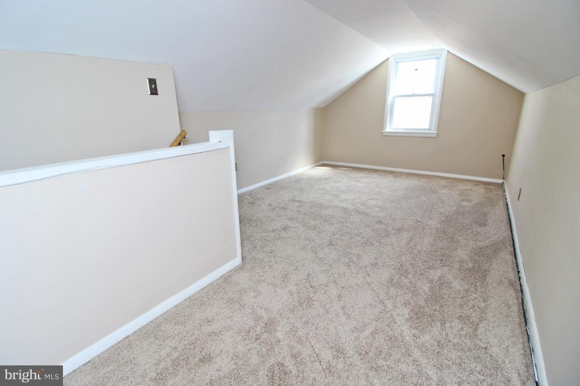 24 Hampton Road Linthicum Heights, MD 21090 - Photo 16 of 23 a view of an empty room with windows