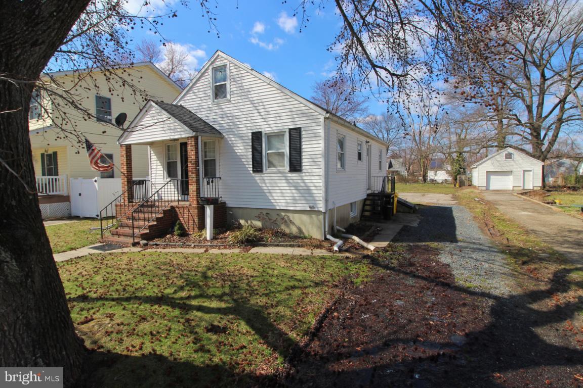 24 Hampton Road Linthicum Heights, MD 21090 - Photo 7 of 23 a front view of a house with a yard