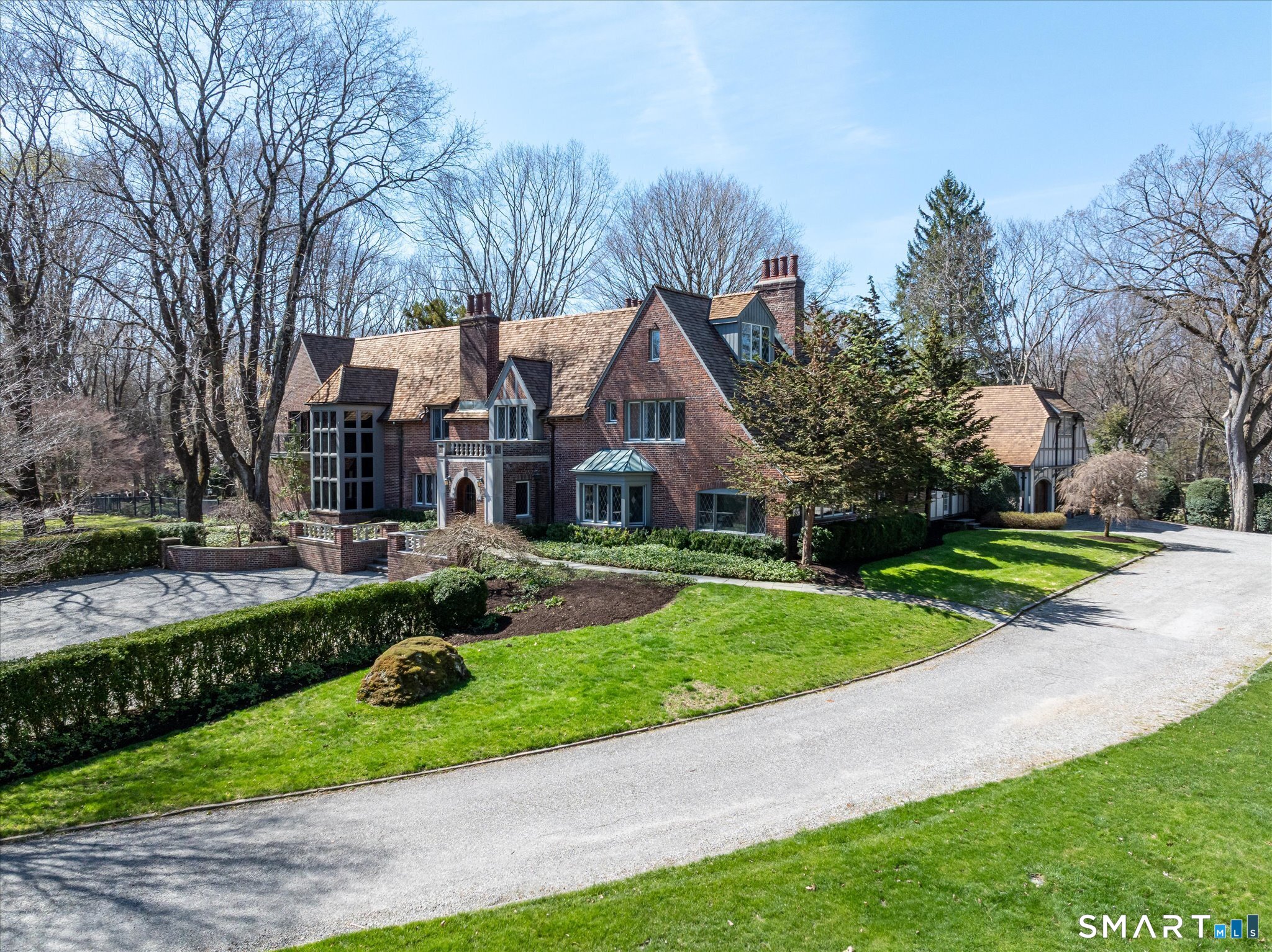 214 Good Hill Road Weston, CT 06883 - Photo 2 of 37 a front view of house with yard and green space