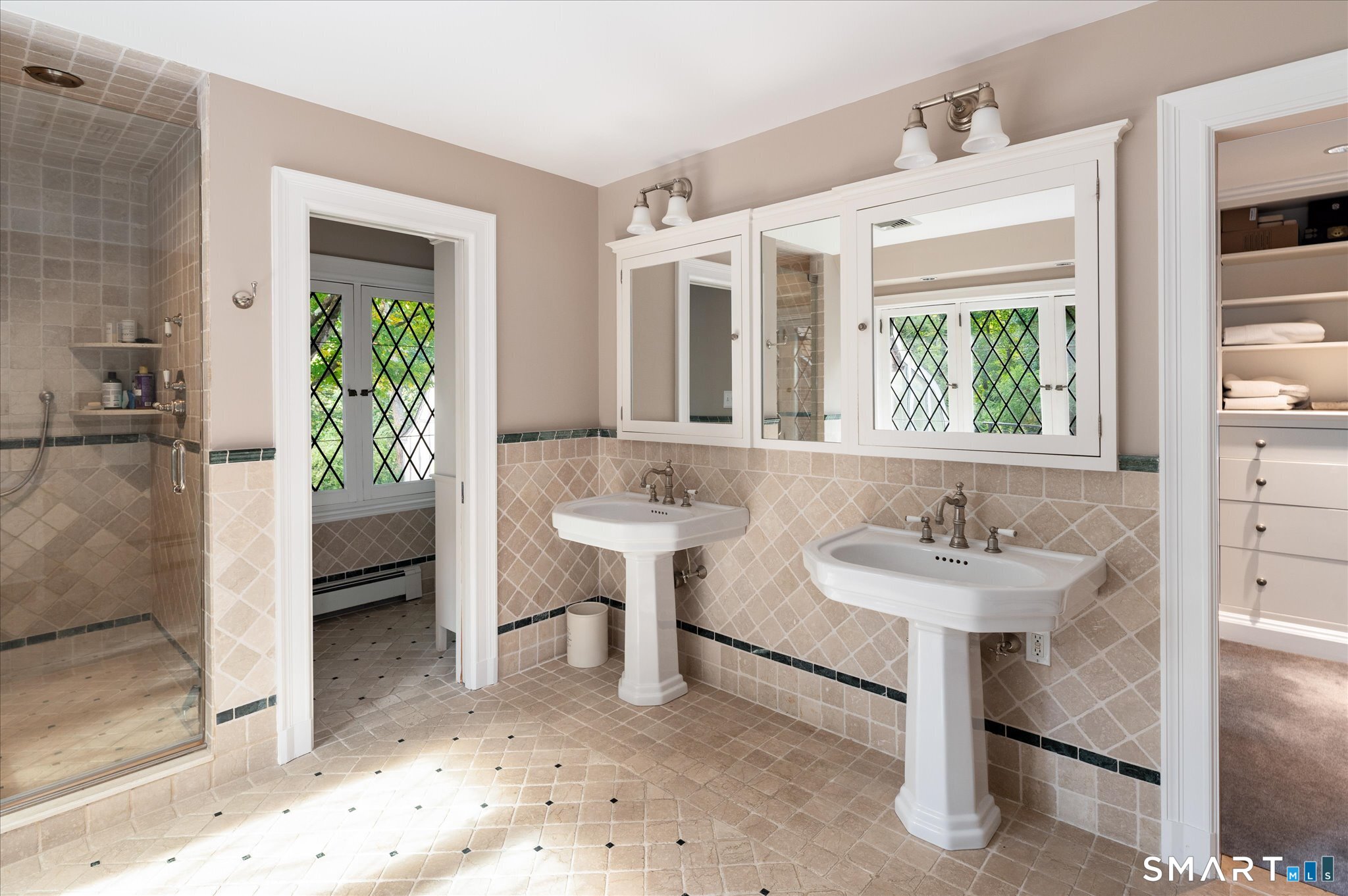 214 Good Hill Road Weston, CT 06883 - Photo 22 of 37 a bathroom with a sink and a mirror