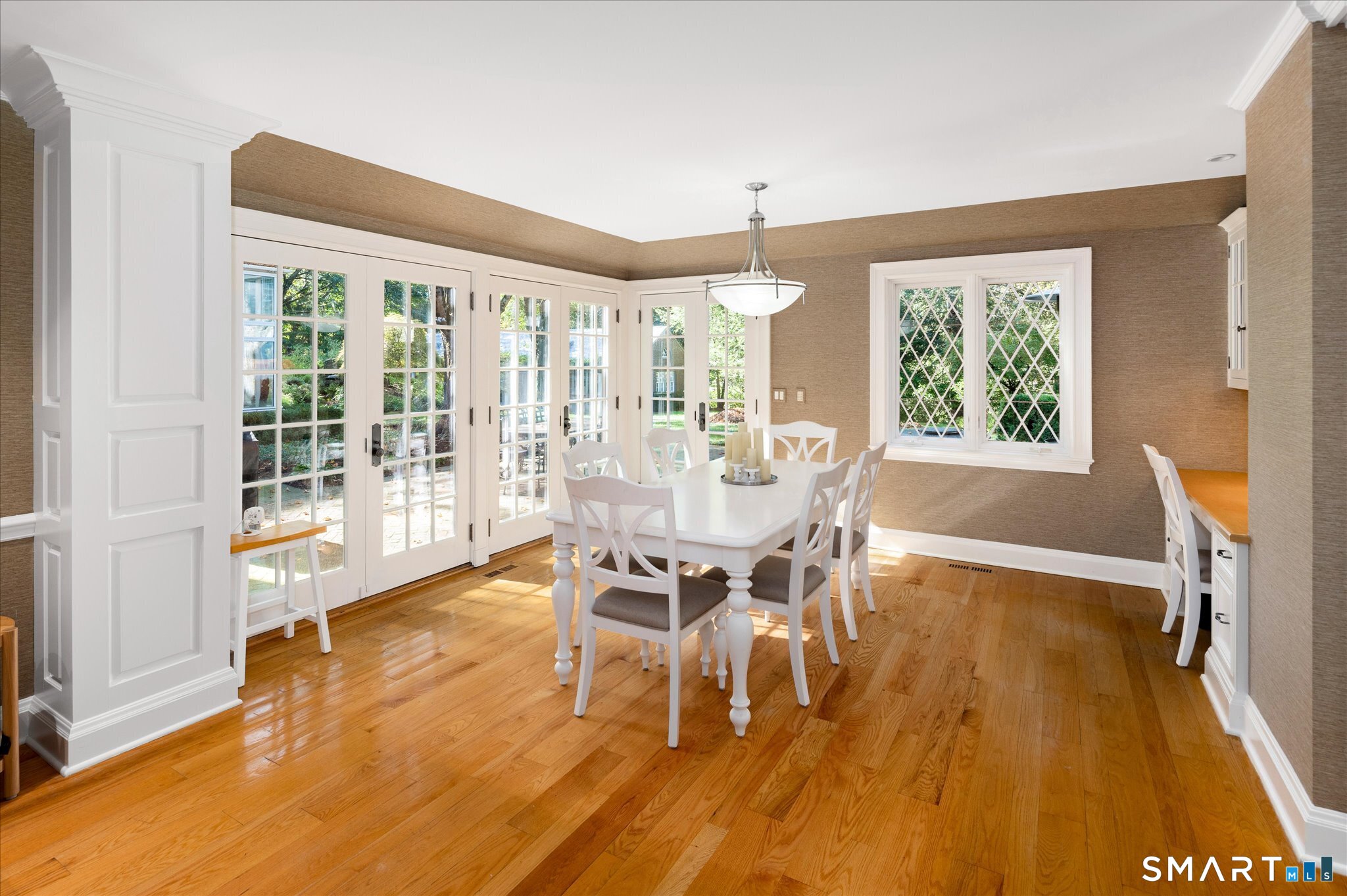 214 Good Hill Road Weston, CT 06883 - Photo 24 of 37 a view of a dining room with furniture window and wooden floor