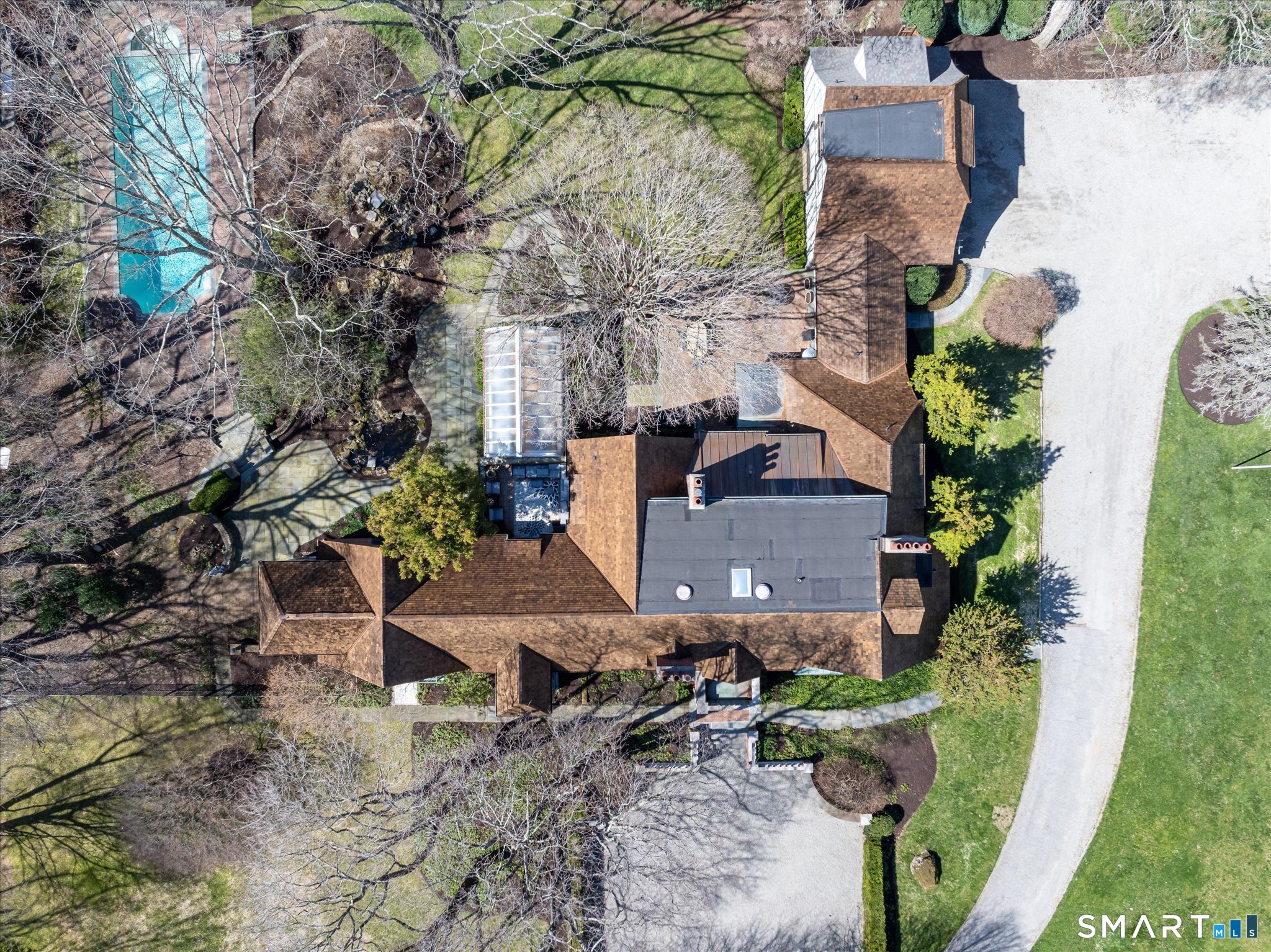 214 Good Hill Road Weston, CT 06883 - Photo 3 of 37 an aerial view of a house with a yard and lake view