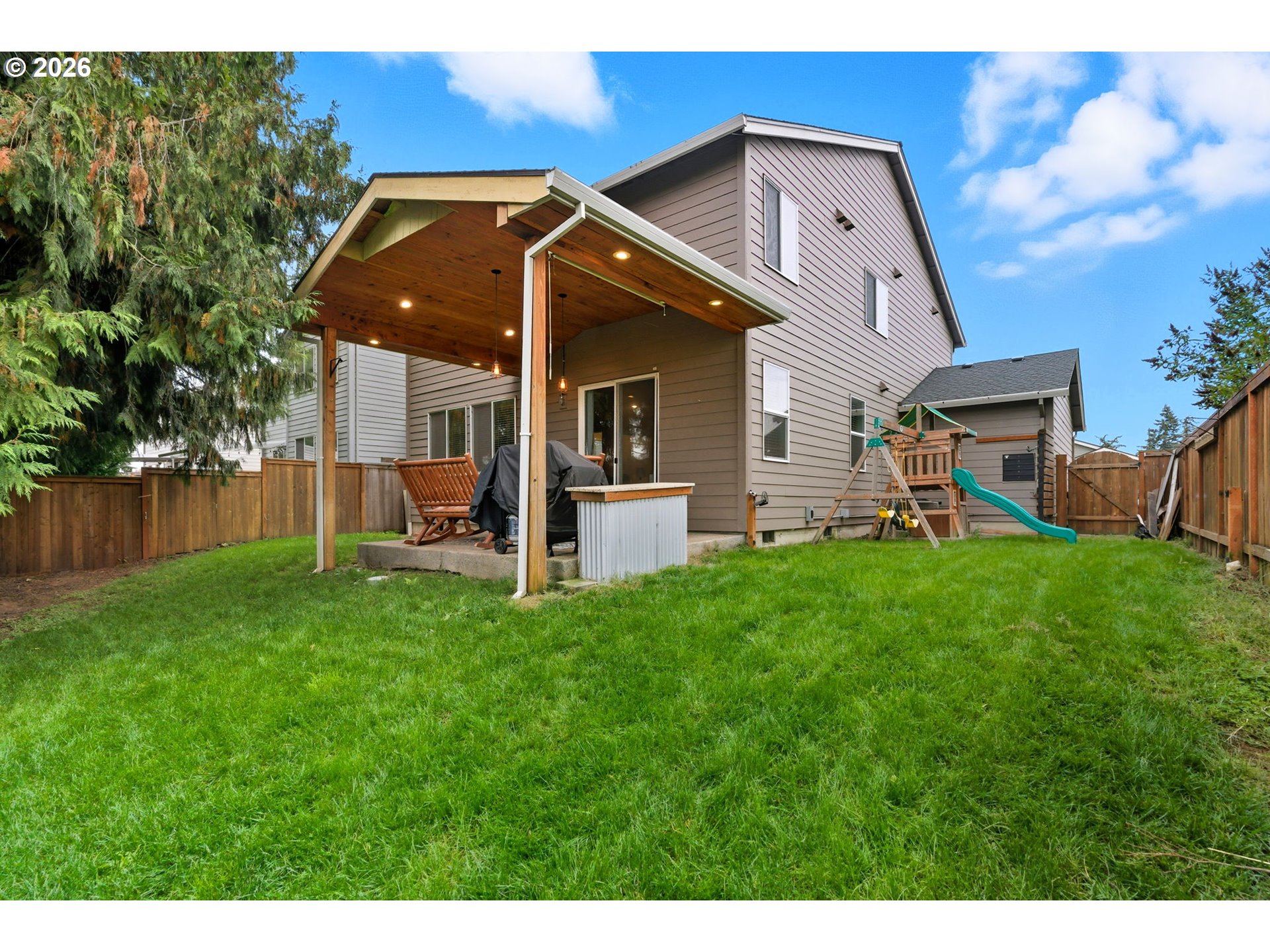 476 Southwest 15th Avenue Canby, OR 97013 - Photo 39 of 41 a front view of a house with garden