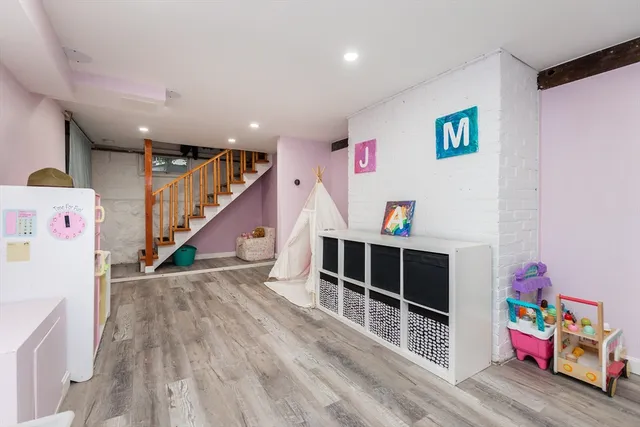 a room with furniture and wooden floor