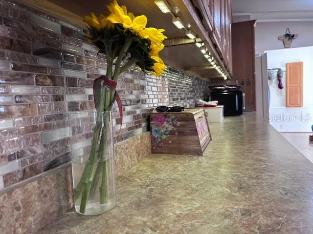 a view of entryway with a wooden door