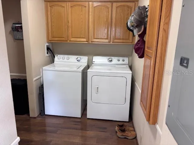 a utility room with dryer and washer