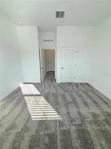 a view of a room with an empty space